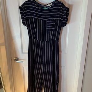 Boot cut dark navy/white striped romper. Size S, flowy, worn lightly